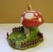 Elf Sitting on Mushroom Cottage2 - Daist McAuliffe